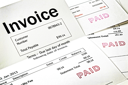 Invoice with Paid Stamp - three invoices with paid stamped on them. All details are imaginary.