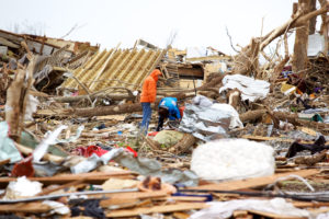 Joplin, United States - May 25, 2011: Joplin Missouri deadly F5 Tornado debris scattered with people looking for personal items only a few days following the storm